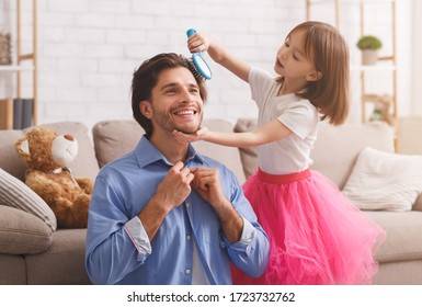 Adorable Little Girl Helping Her Dad To Get Ready Before Job, Brushing His Hair, Home Interior, Copy Space