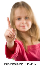 Adorable Little Girl Holding Index Finger Up, Isolated On White