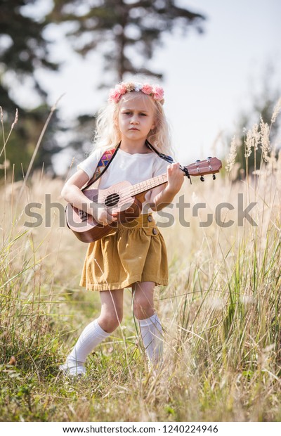 Adorable Little Girl Playing Ukulele Soulful Stock Photo Edit Now