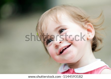 Similar – Image, Stock Photo Adorable little girl playing in a urban park