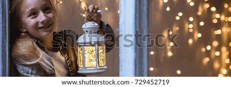 Image, Stock Photo Child hold christmas lamp with glass and candle inside in the night to pine tree.