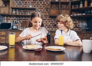 Adorable Little Kids Having Breakfast Before School