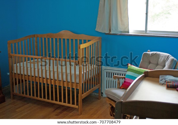 Adorable Nursery Hardwood Floors Wooden Crib Stock Photo