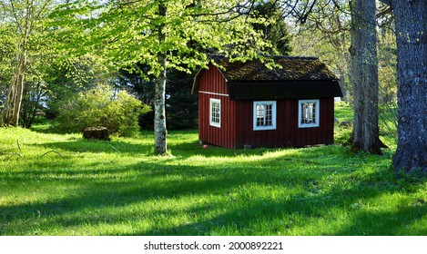 Adorable Old Red Playhouse In Spring