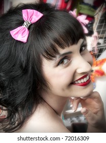 Adorable Pinup Model Wearing Pink Hair Bow