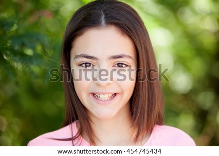 Similar – Adorable preteen girl with plants of background