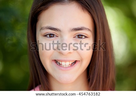 Similar – Adorable preteen girl with plants of background