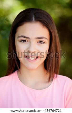 Similar – Adorable preteen girl with plants of background