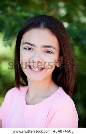 Similar – Adorable preteen girl with plants of background