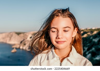 Adorable teenage girl outdoors enjoying sunset at beach on summe - Shutterstock ID 2225404669