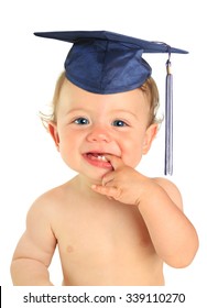 Adorable ten month old baby boy wearing a mortar board.