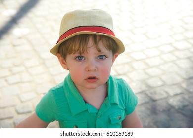 Adorable Toddler Boy Wearing Fedora Sun Hat Walking On Boardwalk On Vacation