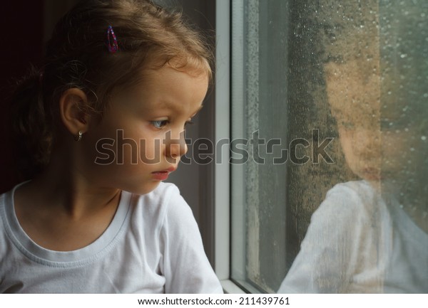 Adorable Toddler Girl Looking Raindrops On Stock Photo (Edit Now) 211439761