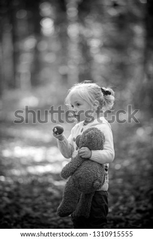 Similar – Image, Stock Photo happy funny kid girl eating fresh apple in autumn