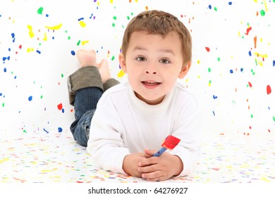 Adorable Two Year Old Toddler Boy Over Paint Splatter Background In Casual.