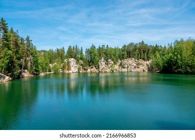 Adrspach Pond. Adrspach-Teplice Rocks are an unusual set of sandstone formations in northeastern Bohemia, Czech Republic. They are named after two municipalities: Adrspach, and Teplice nad Metuji. - Shutterstock ID 2166966853