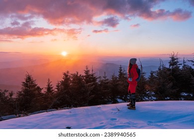 Adult adventurous woman standing on top of a snow peak. Winter Wonderland. . Aerial landscape from Beskydy mountain, Czech republic. Lysa mounta - Powered by Shutterstock