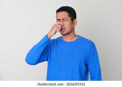 Adult Asian Man Got Nasal Congestion Gesture