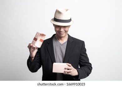 Adult Asian Man  Open A Gift Box On White Background