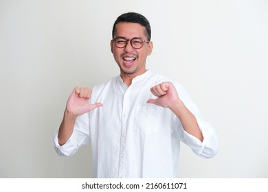 Adult Asian Man Showing Enthusiastic Expression While Pointing To His Self 