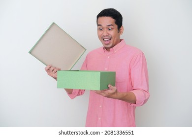 Adult Asian Man Showing Happy Expression When Open A Gift Box