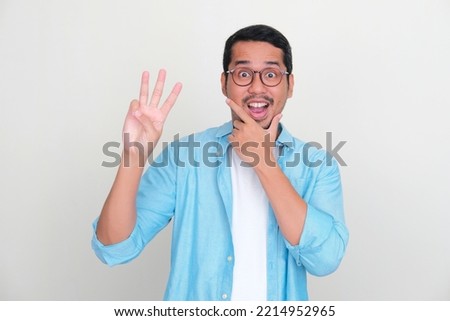 Similar – Image, Stock Photo Three men in orange