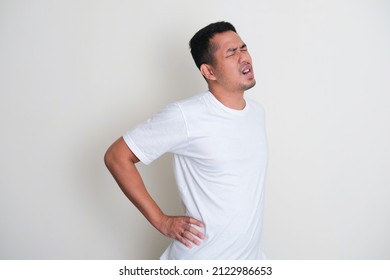 Adult Asian Man Wearing White Plain Tshirt Suffer Low Back Pain