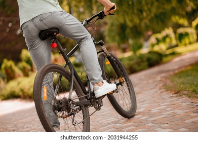 Adult Bicycle Rider Biking On The Bikeway