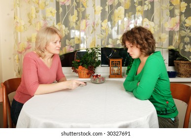 Adult Blond Woman And Young Woman At Difficult Conversation