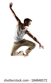 Adult Caucasian Male Dancer Wearing A White Shirt And Beige Pants. Image Is Isolated On A White Background.