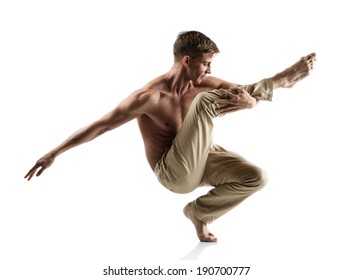 Adult Caucasian Male Dancer Wearing Beige Pants. Image Is Isolated On A White Background.