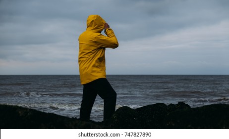 male yellow raincoat