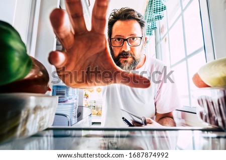 Similar – Image, Stock Photo man taking a weight plate in a gym