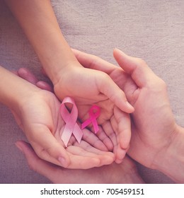 Adult And Child Hands Holding Pink Ribbons, Breast Cancer Awareness, Abdominal Cancer Awareness And October Pink Day Background , World Cancer Day