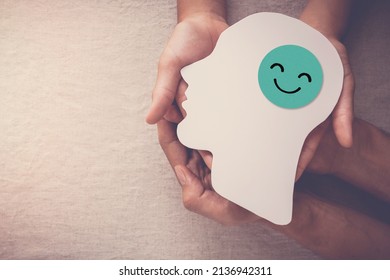 Adult And Child Hands Holding Smile Face In Brain Paper Cutout, Happy Hormones, Brain Chemicals, Positive Mental Health Concept