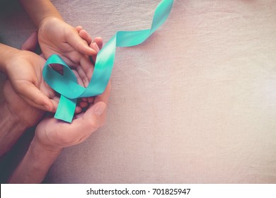 Adult And Child Hands Holding Teal Ribbon, Ovarian Cancer, Cervical Cancer, Pcos Awareness