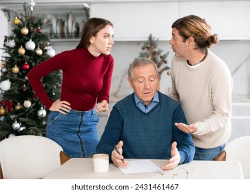 Adult children argue with each other and show their elderly father how to fill out documents correctly - Powered by Shutterstock