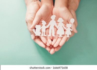 Adult And Children Hands Holding Paper Family Cutout, Life Insurance Planning, Adoption, Foster Care, Homeless Support, Family Mental Health, Family Wellness, Social Distancing Concept