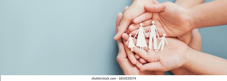 Adult and children hands holding paper family cutout, family home, foster care, homeless charity support concept, family mental health, international day of families - Shutterstock ID 1814233574