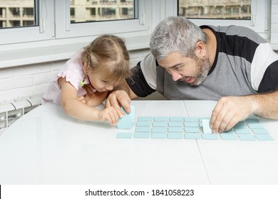 Adult Dad Plays With Cute Little Daughter. Cards For The Development Of Memory. Early Childhood Development