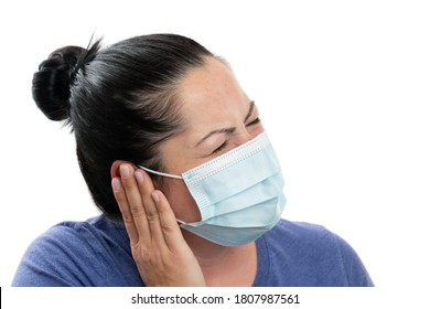 Adult Female Model Touching Ear With Hand As Pain Covid19 Influenza Flu Symptom Concept Wearing Surgical Disposable Mask To Protect From Contamination Isolated On White Studio Background