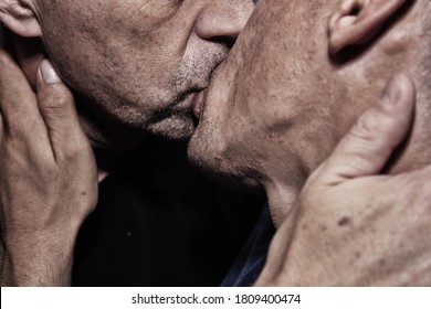 Adult Gay Couple And Kiss.
