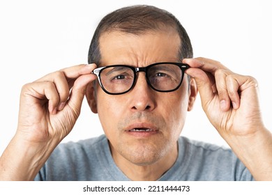 Adult With Glasses Straining His Eyes Because He Can't See, Isolated With White Background