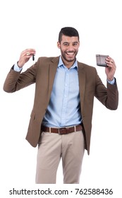 Adult Guy Has Bought A Car And Paid Cash. He Holds His Wallet And Car Key. Isolated On White Background.