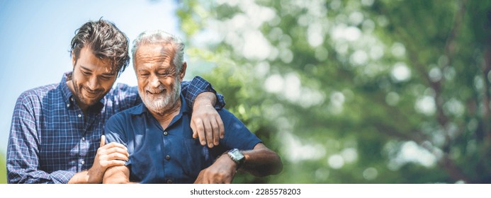 Adult hipster son fun hugging old senior father at home, two generations have a beard talking together and relaxing with smile, 2 man happy enjoy to living at home in father's day with love of family - Powered by Shutterstock