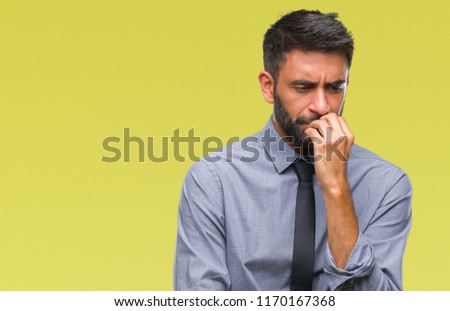 Adult hispanic business man over isolated background looking stressed and nervous with hands on mouth biting nails. Anxiety problem. ストックフォト © 