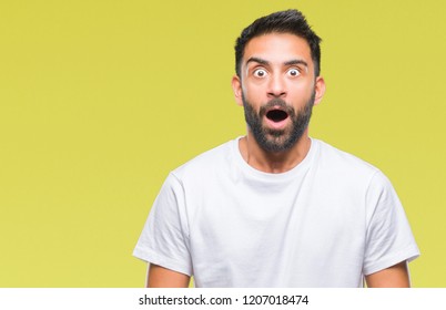 Adult Hispanic Man Over Isolated Background Afraid And Shocked With Surprise Expression, Fear And Excited Face.