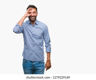 Adult Hispanic Man Over Isolated Background Doing Ok Gesture With Hand Smiling, Eye Looking Through Fingers With Happy Face.