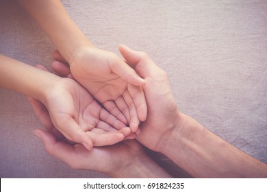 Adult Holding Child Hands, , Pray, Health, Hope, Support Concept, Praying Hands, World Day Of Prayer,international Day Of Prayer, Hope, Gratitude, Thankful, Trust Concept