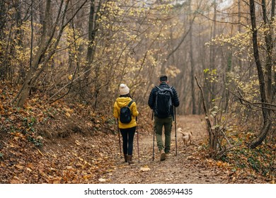 Adult Husband And Wife, Preparing To Start Their Long Trek Early In The Morning.